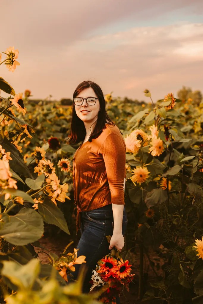 A photo of me in a sunflower field. 